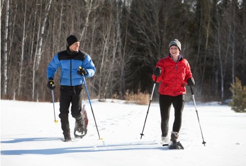 Couple snowshoeing